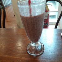 Cocoa, banana, mango and coconut smoothie at Golden Grapes in Glebe