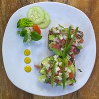 Toast with avocado & pico  at Elephant Garden in Puerto Escondido
