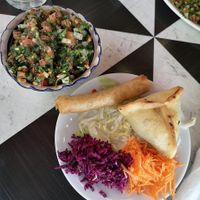 Taboulé and veg beignets. at Lina Restaurant in Paris