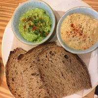 Sourdough bread with guacamole and houmous at Hinterland in Brussels