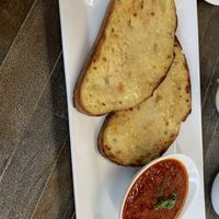 The starter breadsticks. Literally best app. I get every time. I wish serving was bigger. Sauce is literally AMAZING! 10/10  at The Stand Vegan Cafe in Fairfield