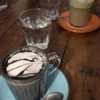 Oat milk charcoal latte and matcha latte at The Canteen in Nailsworth