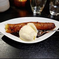 Fried banana with vegan ice cream and chocolate at Deli China in Joensuu