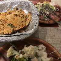 Cheese naan and salad at Govindam Retreat in Jaipur