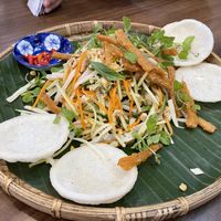 Half-eaten (sorry forgot to take photo before we start!) salad—gỏi ngó sen  at Quán Chay Thiên Phước Quang in Da Nang