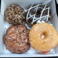 Clockwise from top left: Caramel on parade, x-ray speculoos, strawberrylab, fritter seems forever  at Donut Friend - DTLA in Los Angeles