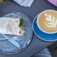 Vegan falafel wrap and almond milk flat white. at Astro Cafe in Lake Tekapo