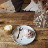 Flat white with oat milk and Cinnamon Roll at WAVE in East London