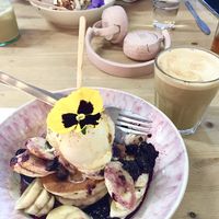 Berry pancakes topped with ice cream and a peanut butter latte 🥰 at WAVE in East London