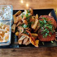 'Tradyszyn' - seitan stake, baked potatoes, cabbage salad and cucumber salad at Caffe Miasto in Warsaw