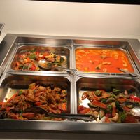 Four dishes: soy fillet with cashews, soy beef in panang curry, soy fish wok, and vegetable wok.  at Pong Klara in Stockholm