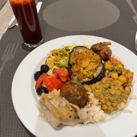 Dinner buffet plate, beet & carrot juice  at Jardim das Cerejas - Chiado in Lisbon