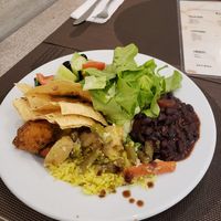 My plate with nachos, salad, rice and black beans at Jardim das Cerejas - Chiado in Lisbon