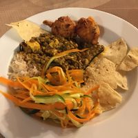 Curry with salad, pakora and papadom.   at Jardim das Cerejas - Chiado in Lisbon