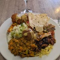 Loaded plate full of food at Jardim das Cerejas - Chiado in Lisbon