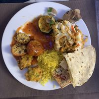 A mix of dishes from the buffet, including lasagna and meatballs  at Jardim das Cerejas - Chiado in Lisbon