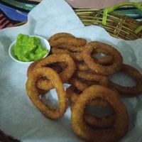 Onion rings with guacamole (vegan) at Burgershack in Kampot