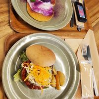 DELICIOUS. Pancakes with sweet potato. Whole grain burger. I didn't have room for the soft serve. at Rakuen Cafe in Naha