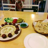 Felafel, hummus, baba ganoush, pickles, salad, and Yemeni chilli at Sababa in Chiang Mai