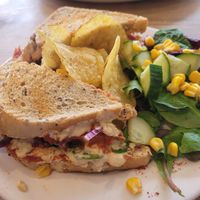 Vegan club sandwich on brown (hummus, falafel, sundried tomatoes, Tinned tomatoes, spinach, red onion, sweetcorn, olives) at The Funky Monkey in Stockport