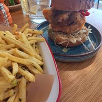 Rosemary salt fries with tempura oyster mushroom bun at Friend of Mine  in Bridge Of Allan