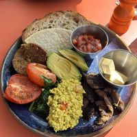 Vegan brunch (toast, maple beans, haggis, avocado, tomato, spinach, miso mushrooms and tofu scramble)  at Friend of Mine  in Bridge Of Allan