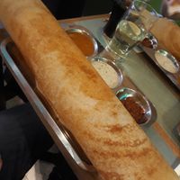 Huge Dosa. Yes, those are pint glasses in the background. at Chennai Express in Basingstoke