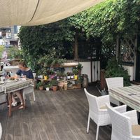 Terrace next to the river at Hilberger's Beisl in Kaprun