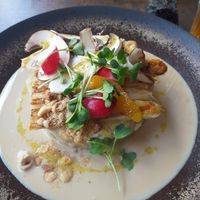 Un plat : purée de noisettes avec plein de bonnes choses dessus at Le Potager de Charlotte - Rennequin in Paris