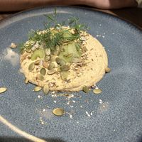 Hummus (good but comes with stale bread)  at Le Potager de Charlotte - Rennequin in Paris