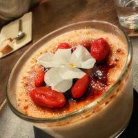 Crème brûlée: 
Crème brûlée with Madagascar bourbon vanilla, caramelized brown sugar, and goji berries at Le Potager de Charlotte - Rennequin in Paris