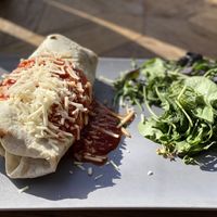 Vegan tortilla with soy Ragout and tomato sauce   at Tom Almhütte in Maria Alm