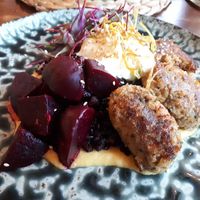 "Chicken" left A, corn puree, black rice, smoked beetroot and yoghurt and dill foam at Coco Cuina Viva in Cadaques