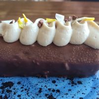 Churro de chocolate y platano at Coco Cuina Viva in Cadaques