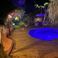 Pool near the room at Blue Earth Village in Bunutan