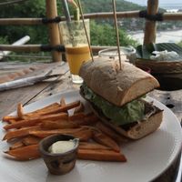 Quinoa mushroom burger with yam fries delish at Blue Earth Village in Bunutan