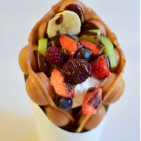 Bubble waffle with fresh berries/fruits and non dairy ice-cream.  at SIA Putni in Jelgava