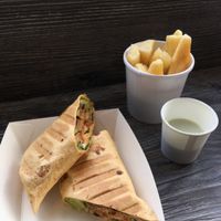 TLT (toasted): Tempeh, lettuce, tomato wrap, with avo, home made mayo and a side of cassava chips with cuban mojito sauce at Simple and Good in Enfield
