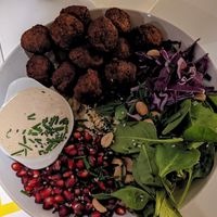 Meatballs with bulgur wheat and pomegranate at Made with Laf in Bratislava
