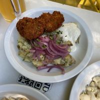 Schnitzel with potato salad   at Made with Laf in Bratislava