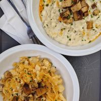 2 types of halušky (sour cabbage, chives), as served in June 2024. at Made with Laf in Bratislava