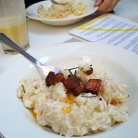 Traditional Halusky with grilled tempeh and chives on top, as served in October 2019. at Made with Laf in Bratislava