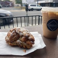 The almond croissant and an oat milk caramel latte!  at Hazel & Jade Bakery in San Diego
