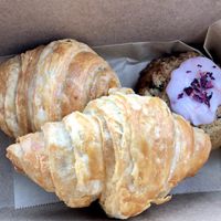 Breakfast croissants and a rose and pistachio scone  at Hazel & Jade Bakery in San Diego
