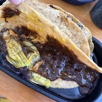 Flor de calabaza and mole  at Quecas El Comal in Cabo San Lucas