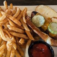 Beyond brat on pretzel bun (vegetarian). Fries are cooked in same oil as meat so that is a personal call for many. at South Gate Brewing Company in Oakhurst