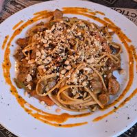 Noodles with meatballs at La Factoría Vegana in Leon