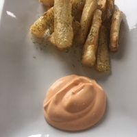 Yucca fries with spicy mayo. Amazing.  at Mind Your Belly in Richmond