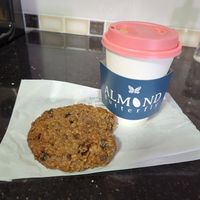 Breakfast cookie and tumeric latte. They don't have a ton of vegan options but everything is well labeled. at Almond Butterfly - Harbord St in Toronto