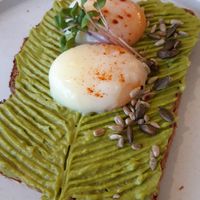 Avocado toast with eggs at Manjerica in Lisbon